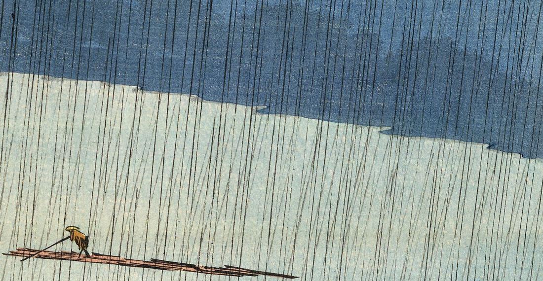 Detail of Hiroshige's rain: hairline slanted lines falling across a dark cloud band and paler sky, with title cartouches at the upper right.