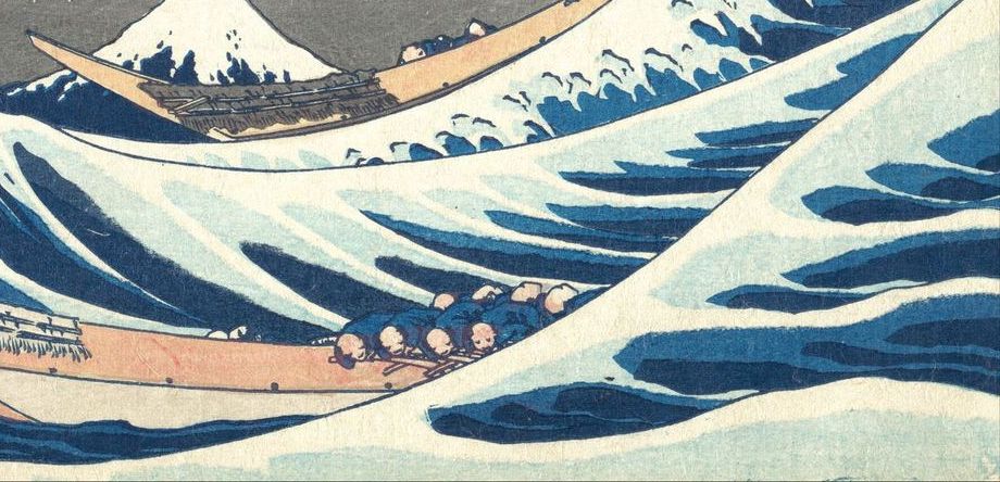 Detail of the Great Wave: three narrow cargo boats packed with rowers in blue-and-white garments, bent over their oars.